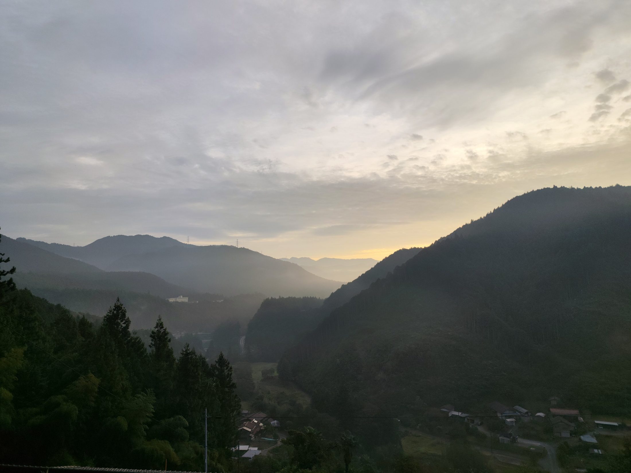 Dawn over the Okumikawa valley, seen from the garden road
